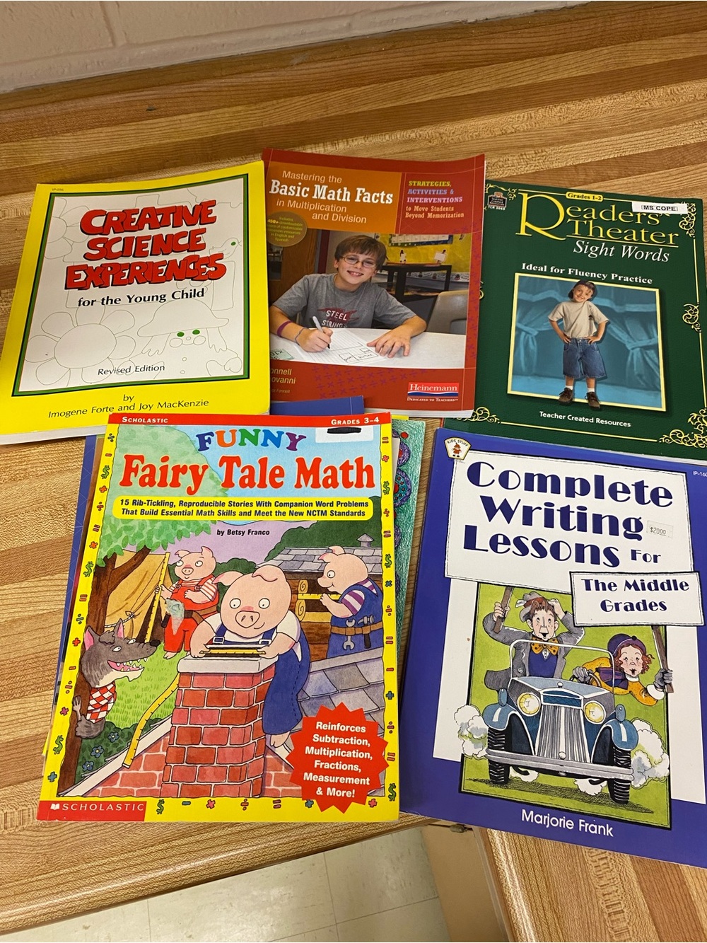 Kids reading, writing, math, science and drawing books